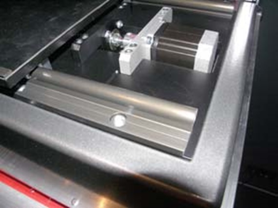 Oversized recirculating ball bearing guides were replaced by "DryLin® W" linear guides on the workpiece table in the laser system "c-jet".