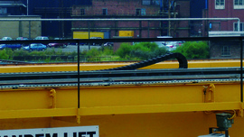 Chaîne porte-câbles dans une grue extérieure Corus Rail
