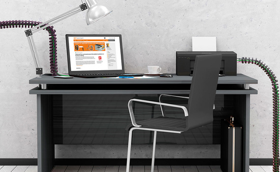 Afbeelding van een bureau met een kantoor-kabelrups