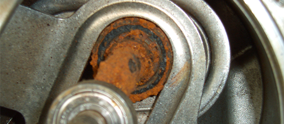 Corroded metal bearing in a petrol pump