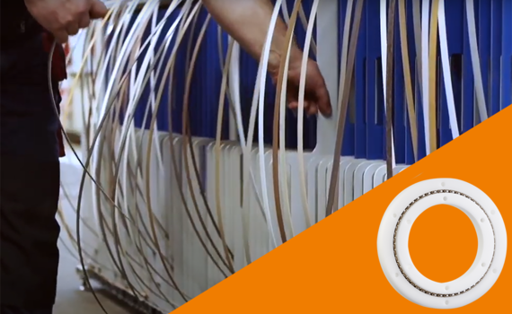 xiros® Drehverbindungen in einer Lagerung für Kantenrollen